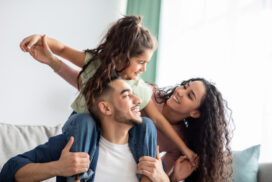 Cheerful,Middle,Eastern,Family,Of,Three,Having,Fun,Together,At