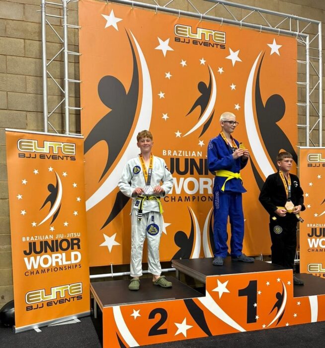Lawn Manor Academy Roman on the podium at the brazilian jiu jitsu junior world championships