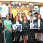 The History team (left), A Level and Key Stage 3 students with Headteacher, Melissa George (right) copy