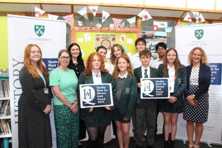The History team (left), A Level and Key Stage 3 students with Headteacher, Melissa George (right) copy
