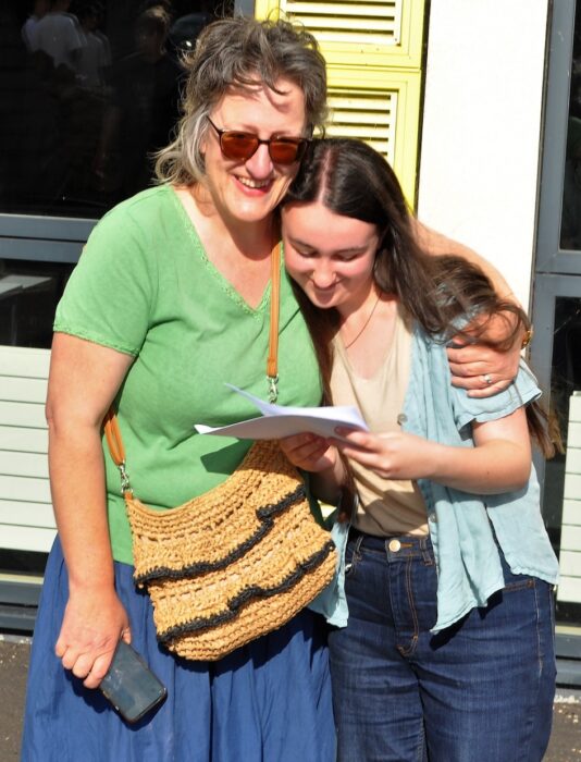 St Gregory's 1. grace celebrating outstanding a level success with her family