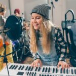 Stage 2 Studios Kids,rock,band,playing,instruments,in,music,studio