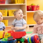 Little,toddlers,boys,and,a,girl,playing,together,in,kindergarten