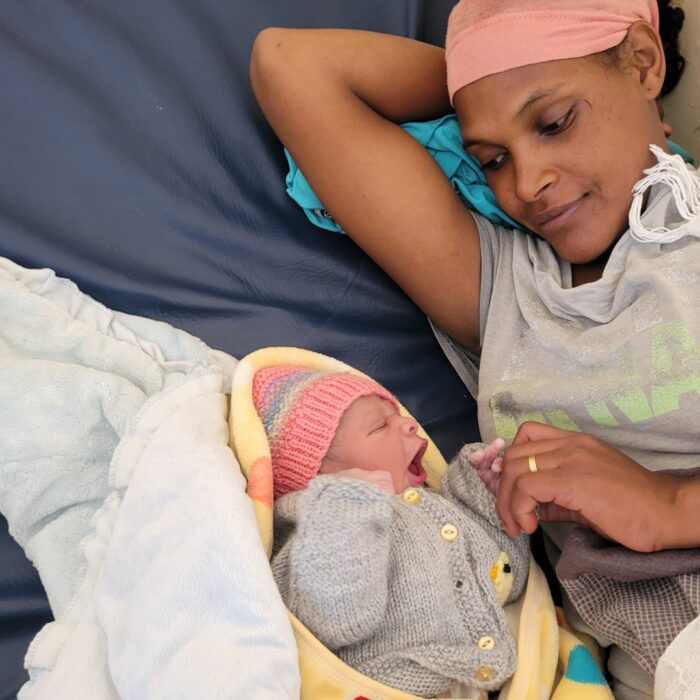 A mum and her newborn baby