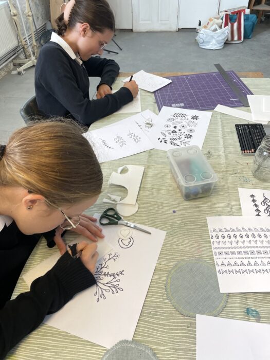 Make creative two pupils