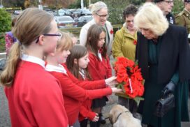 Monkton park primary pupils present their wreath to hm queen camilla (1)