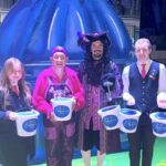 Bath pantomime stars and trb front of house team celebrate total raised by charity collections