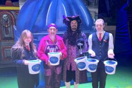 Bath pantomime stars and trb front of house team celebrate total raised by charity collections