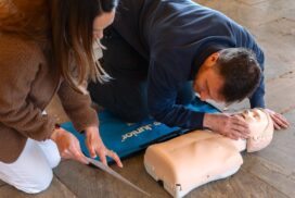 Parents practise child emergency response skills on a Nurture Knowledge child health course
