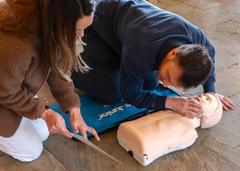 Parents practise child emergency response skills on a Nurture Knowledge child health course