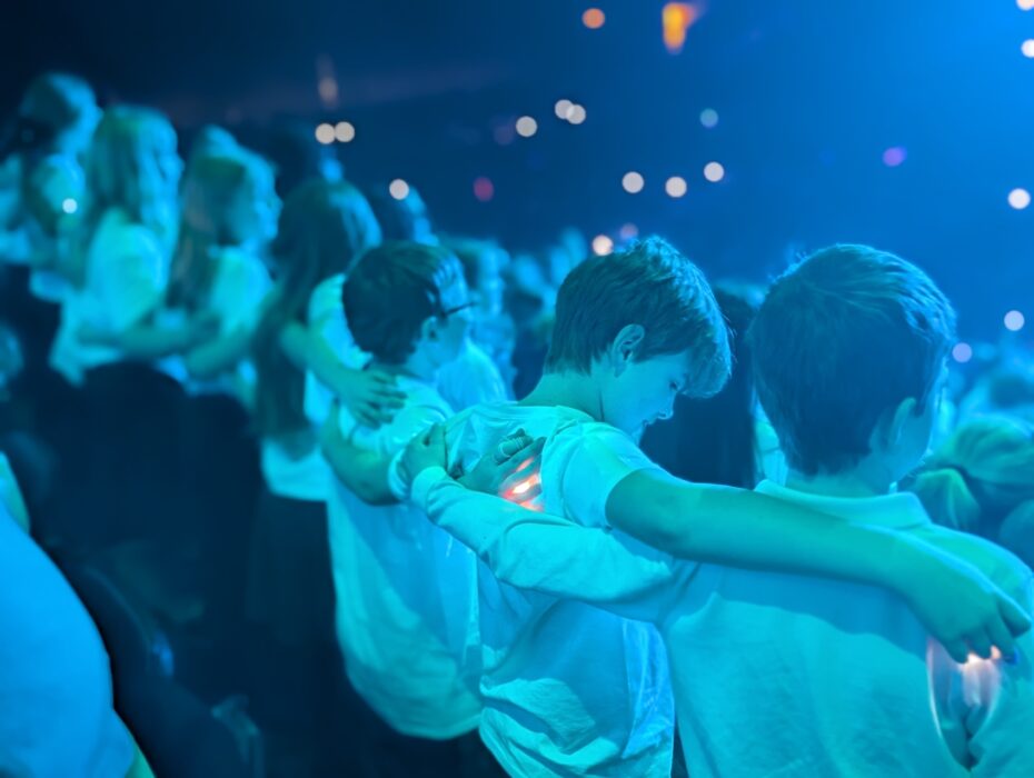 Young Voices was founded in 1992 with the aim of growing choir singing in UK primary schools. Each January and February, the organisation hosts concerts in major arenas nationwide, bringing thousands of children together to sing in unison.Pupils from St Mary’s had been rehearsing since September, preparing a varied programme that included a medley from Wicked and Power in Me.

The school has been involved with Young Voices for a number of years. Its recent award of the West of England Music and Arts (WEMA) Music Mark highlights the importance St Mary’s places on music and creative learning.

Cathie Lampert, Headteacher at St Mary’s, said, “Young Voices was truly amazing. Seeing students sing together, support one another, and light up on stage showed how important singing is for mental health — it lifts spirits, strengthens resilience, and reminds us we’re never alone.”

For the pupils involved, the experience was one they will remember for a long time. One Year 5 pupil said, “I loved being part of Young Voices — singing with so many people was unforgettable.”