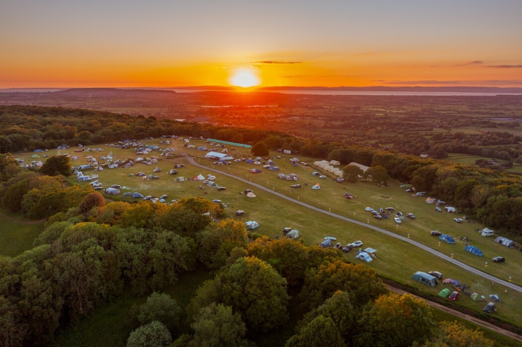 Mendip Basecamp launches six Mini Fests with live music, storytelling, circus skills and family entertainment across July and August.