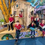Batheaston Church school opens a magical new library designed by local artists, featuring murals, cosy reading spaces and a bespoke indoor treehouse.