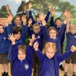 Five Bath area primary schools unite in a joyful Easter song, saving £1,400 in travel costs while reducing their carbon footprint.
