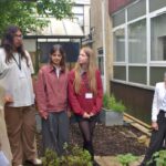 Bath MP Wera Hobhouse praised Ralph Allen School students in Parliament after visiting their award-winning sustainability and healthy food projects.