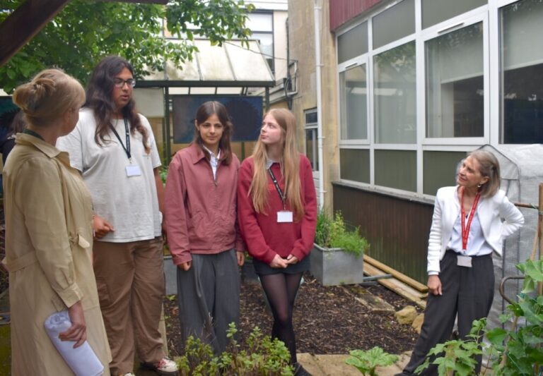 Bath MP Wera Hobhouse praised Ralph Allen School students in Parliament after visiting their award-winning sustainability and healthy food projects.
