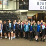 Pupils from St Benedict's Catholic Primary School visited Cheddar Gorge to explore Britain's prehistoric past and bring their Stone Age learning to life.