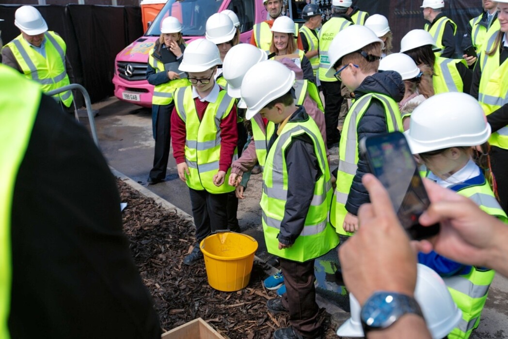 Pupils from schools across Trowbridge have buried a time capsule at the town's new leisure centre, capturing life in 2026 for future generations.