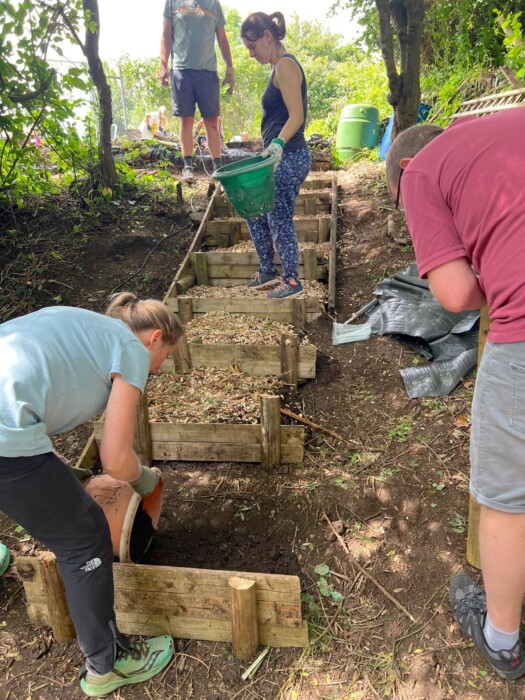 More than 40 One Church Keynsham volunteers have transformed an overgrown garden at Lift Broadlands into a new outdoor space for students.