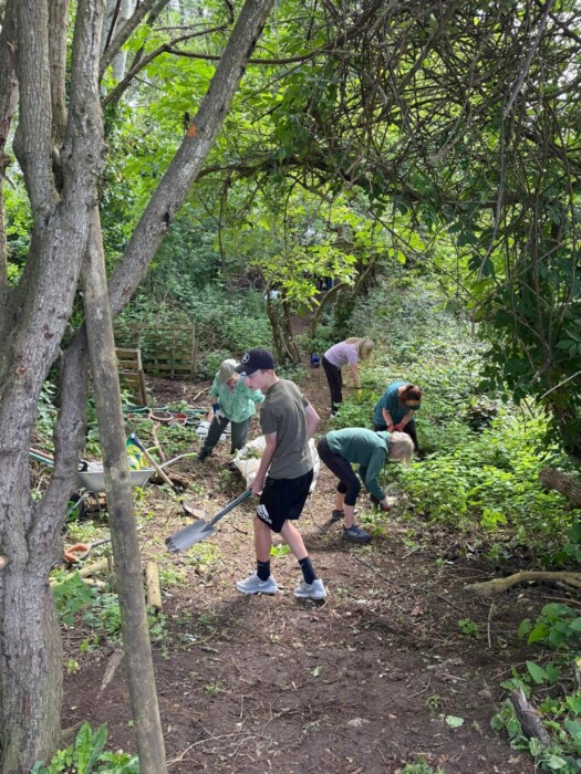 More than 40 One Church Keynsham volunteers have transformed an overgrown garden at Lift Broadlands into a new outdoor space for students.