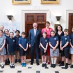Freshford Church School pupils welcomed the US Ambassador as he opened a rare Declaration of Independence exhibition at the American Museum in Bath.