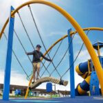 Families can look forward to a new inclusive play area at Keynsham Memorial Park, with climbing walls, swings, a carousel and play mounds.