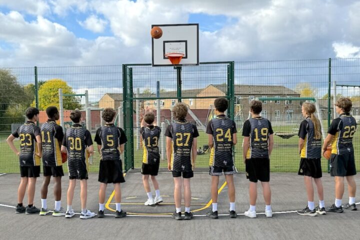 Royal Wootton Bassett Academy students are first to play on a new public basketball court at Showfield Park, providing a boost for local sport.