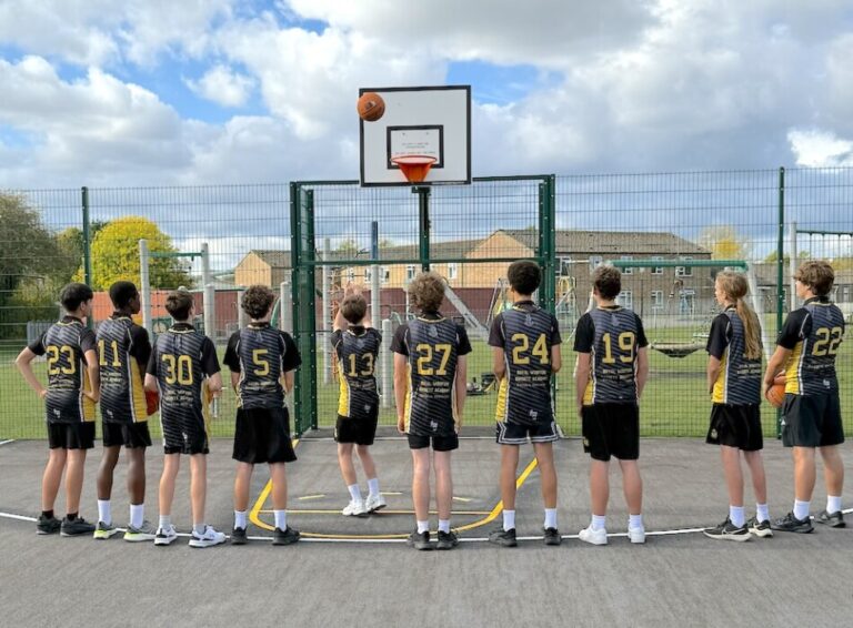 Royal Wootton Bassett Academy students are first to play on a new public basketball court at Showfield Park, providing a boost for local sport.