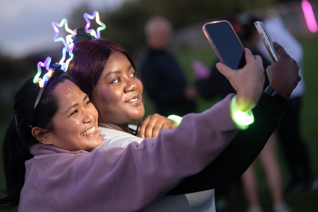 More than 350 people joined the RUHX Glow Run at Odd Down Sports Ground in Bath, raising over £18,000 to support patients at the Royal United Hospital.