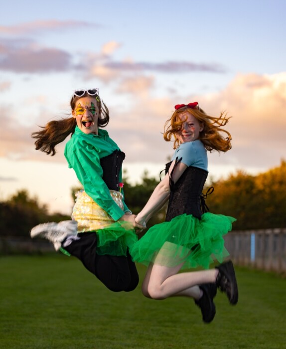 More than 350 people joined the RUHX Glow Run at Odd Down Sports Ground in Bath, raising over £18,000 to support patients at the Royal United Hospital.